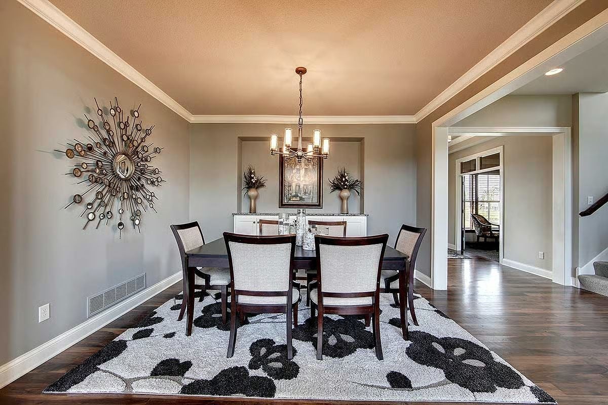 Sunburst Wall Art and a Patterned Rug Do the Heavy Lifting Here