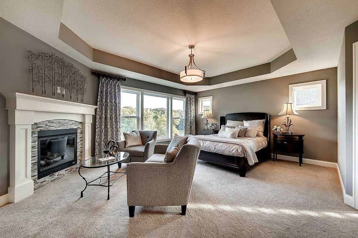 Tray Ceiling, Fireplace, and a Sitting Area That Earns Its Square Footage