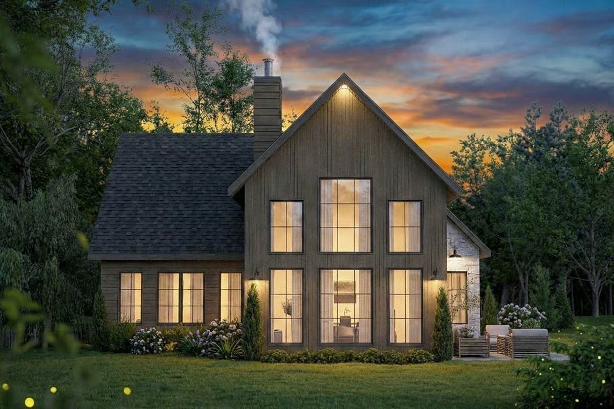 Warm Light Pours Through Floor-to-Ceiling Windows at Dusk