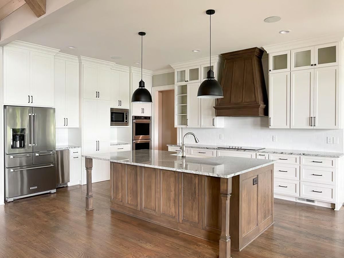 Walnut Island, Wood Range Hood, and Granite That Ties It All Together