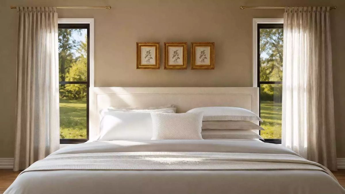 Linen Curtains and Gold Frames Turn a Simple Bedroom Into Something Worth Waking Up In