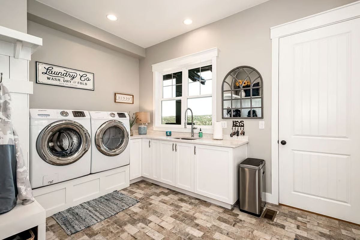 Laundry Co. Sign and Raised Pedestals Make Chores Feel Like Less of a Chore