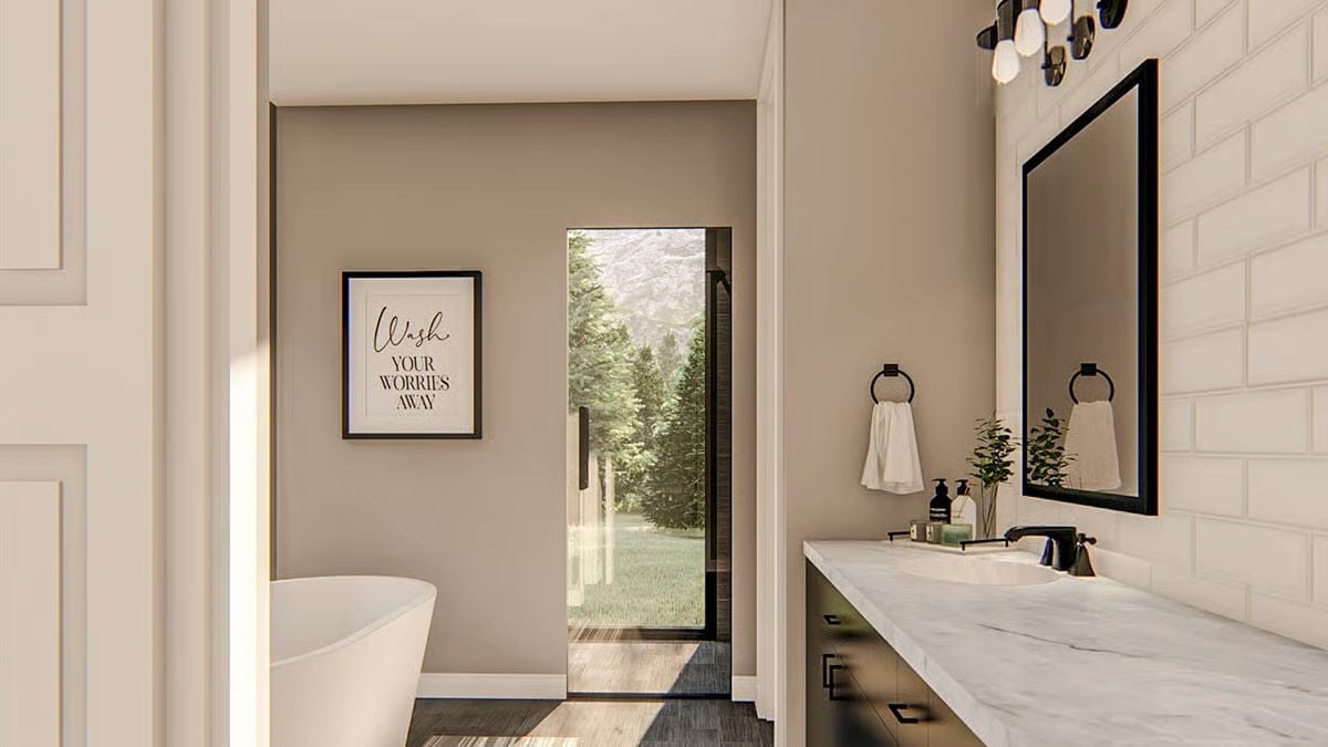 Marble Vanity, Subway Tile, and a Shower Window That Opens to the Trees