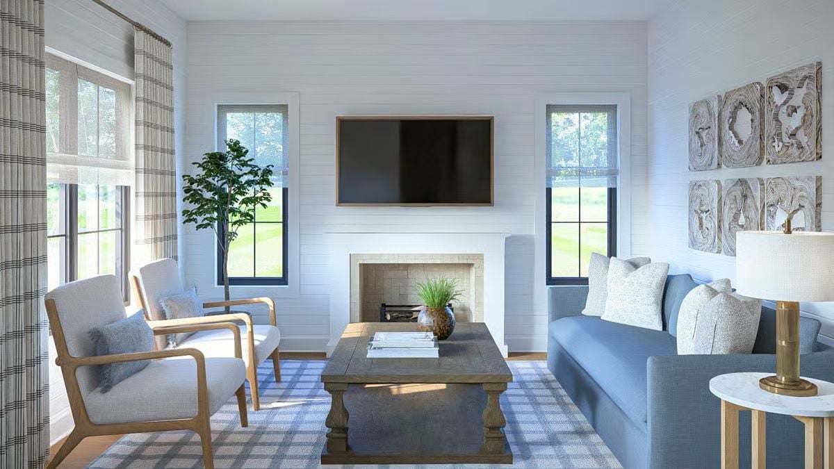 Blue Sofas, a Wood-Framed TV, and a Fireplace That Actually Gets Used