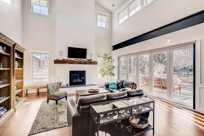 Double-Height Fireplace Wall Does the Heavy Lifting in This Great Room