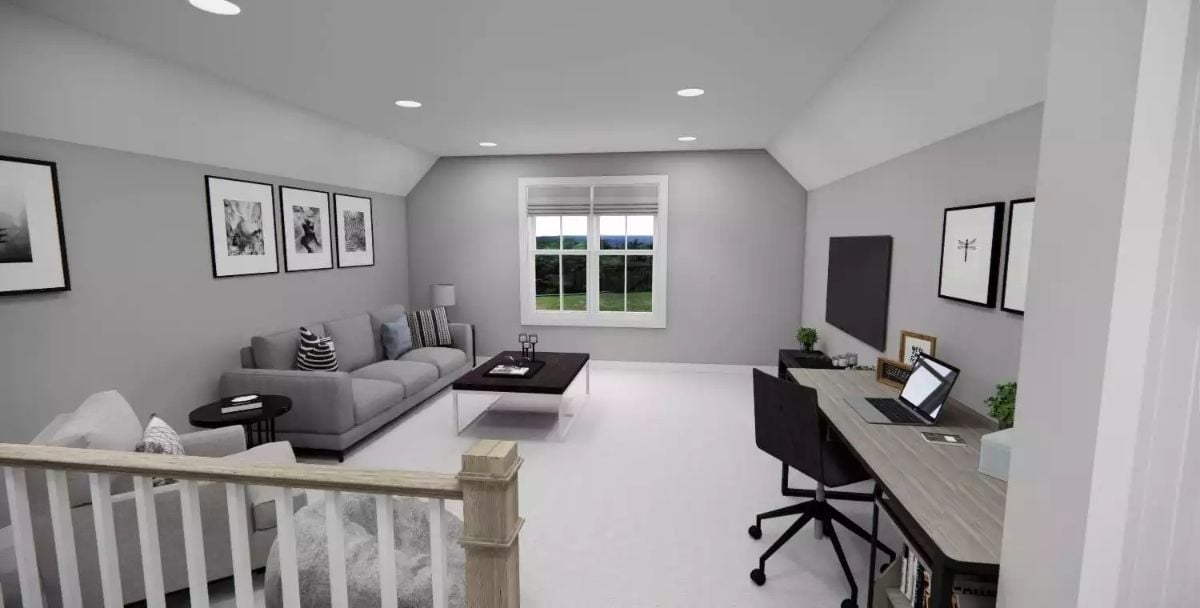 Loft Space With a Desk Setup That Proves Work and Lounge Can Share a Room