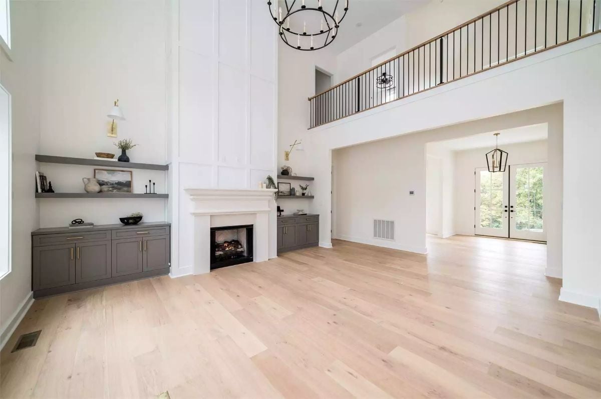 Double-Height Fireplace Wall That Earns Every Inch of Vertical Space