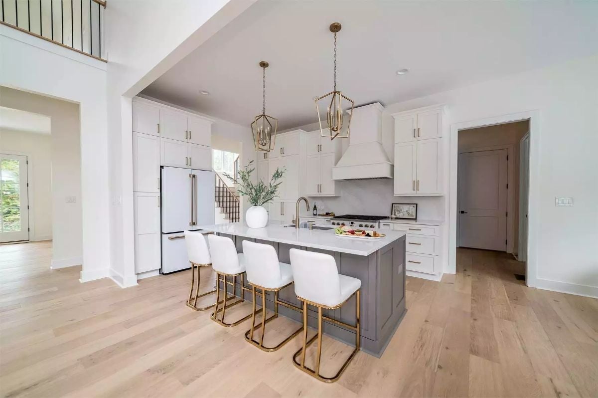 Gold-Framed Barstools and a Gray Island That Pulls the Whole Kitchen Together
