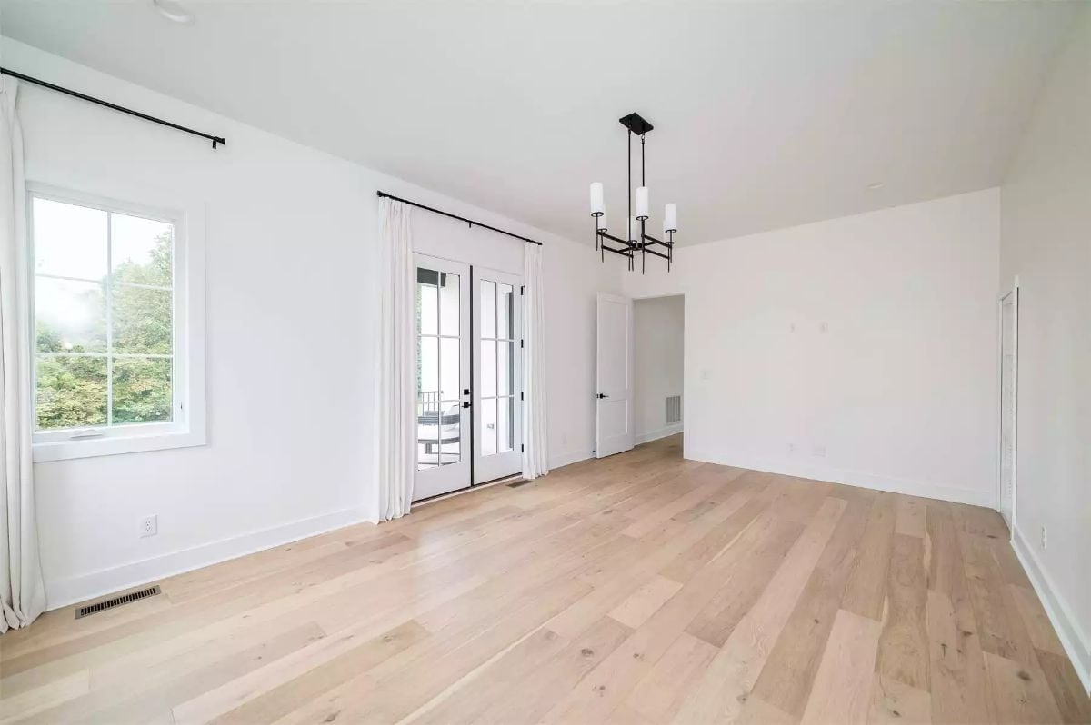 Light Wood Floors and Black Hardware That Know Exactly What They're Doing