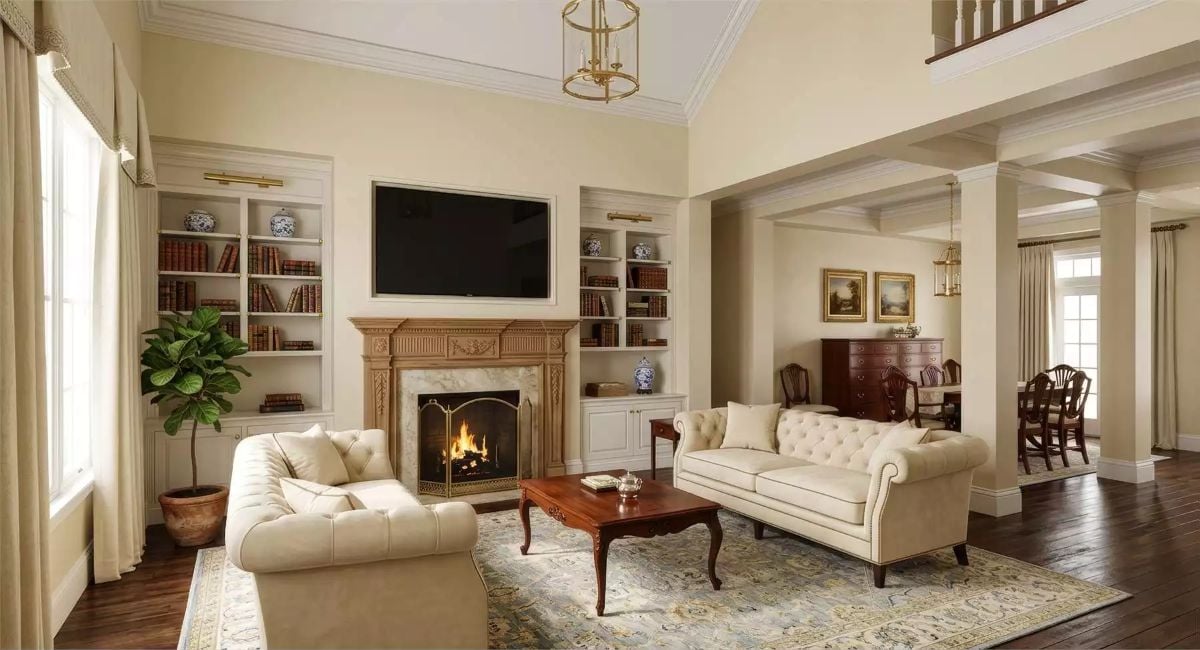 Cream Chesterfields and a Carved Mantel Make This Fireplace Wall Hard to Walk Past
