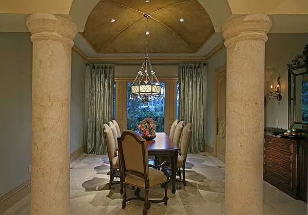 Marble Columns, a Groin Vault, and Candlelight Before Anyone Sits Down