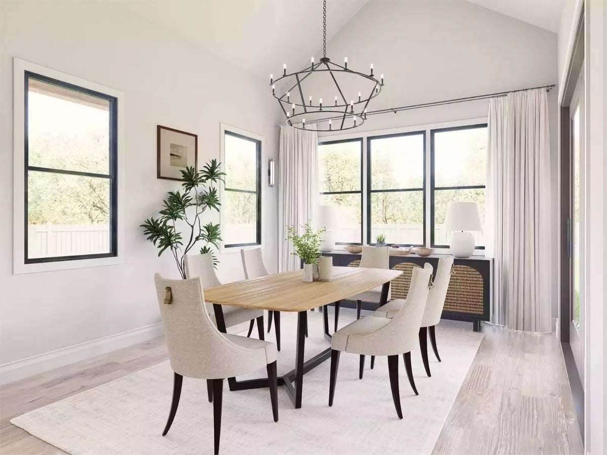 Wagon Wheel Chandelier Earns Its Keep Above a Table Built for Six