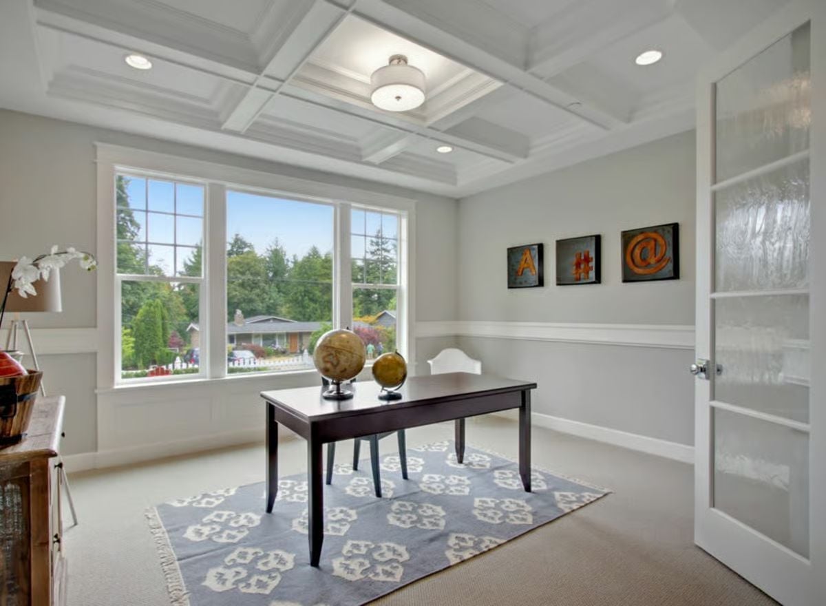 Coffered Ceiling, Twin Globes, and Wall Art That Spells Something