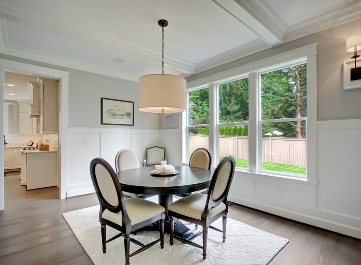Round Table, Dark Wood, and a Pendant That Actually Fits the Room
