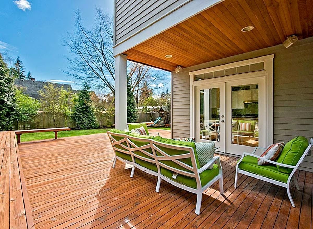 Cedar Ceiling, Green Cushions, and a Covered Deck That Actually Gets Used