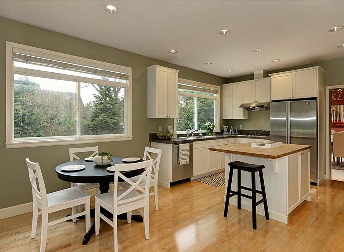 Olive Walls and a Butcher Block Island That Pull the Whole Kitchen Together