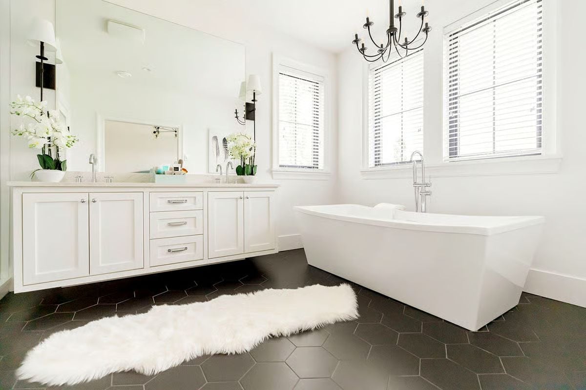 Freestanding Tub, Chandelier, and a Rug That Has No Business Being That White