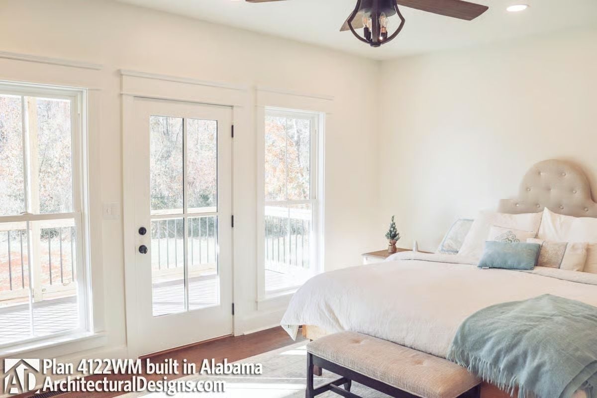 French Doors to a Deck and a Tufted Headboard That Earns Its Square Footage