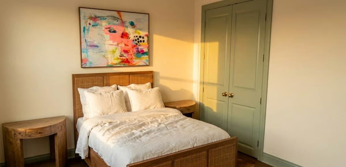 Woven Rattan, White Linen, and Morning Light That Does the Decorating