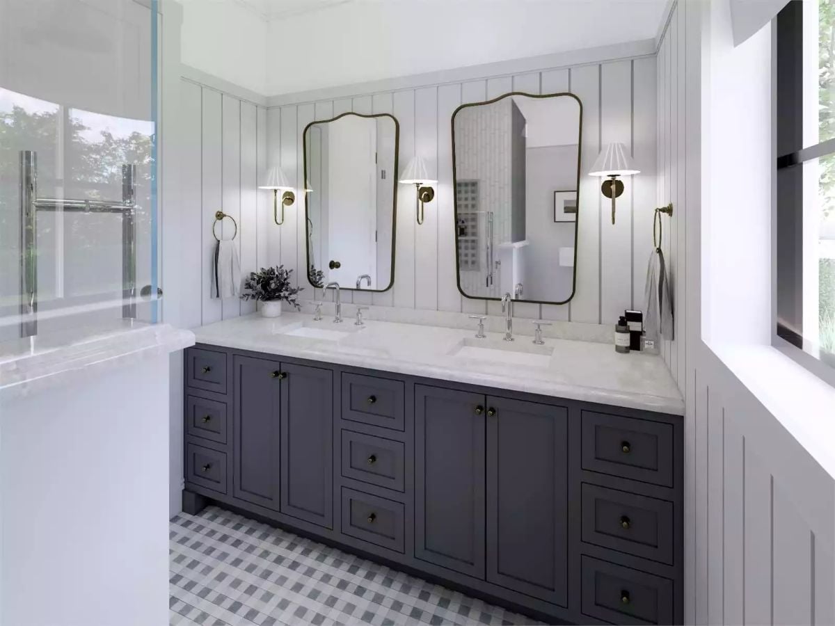Wavy Brass Mirrors and a Dark Vanity That Anchors the Whole Room
