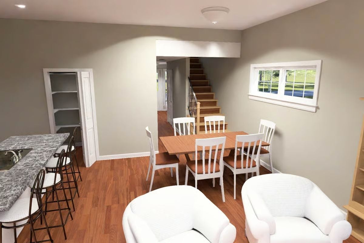 Staircase Views and White Dining Chairs Pull Double Duty as the Room's Focal Points