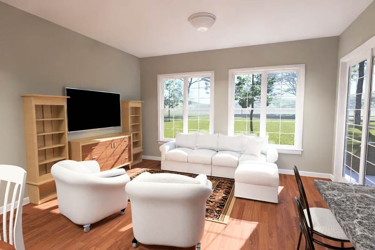 White Slipcover Sofas and Hardwood Floors Make the TV Wall Worth Ignoring