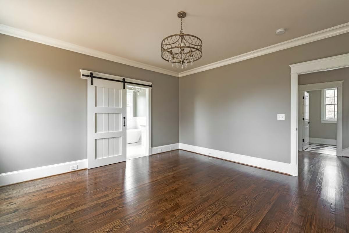 Barn Door to the Bathroom and a Chandelier Nobody Expected
