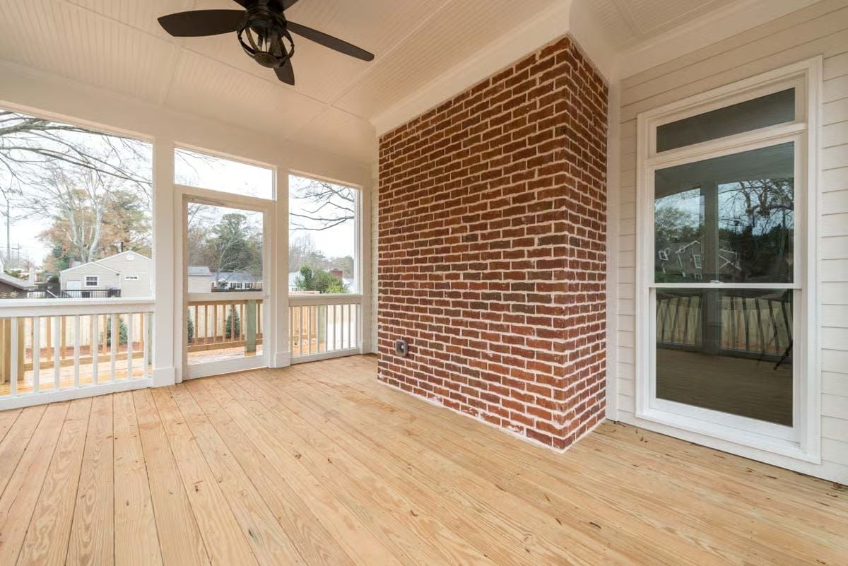 Brick Chimney Column, Ceiling Fan, and a Screened Porch With Nowhere to Put a Couch Yet