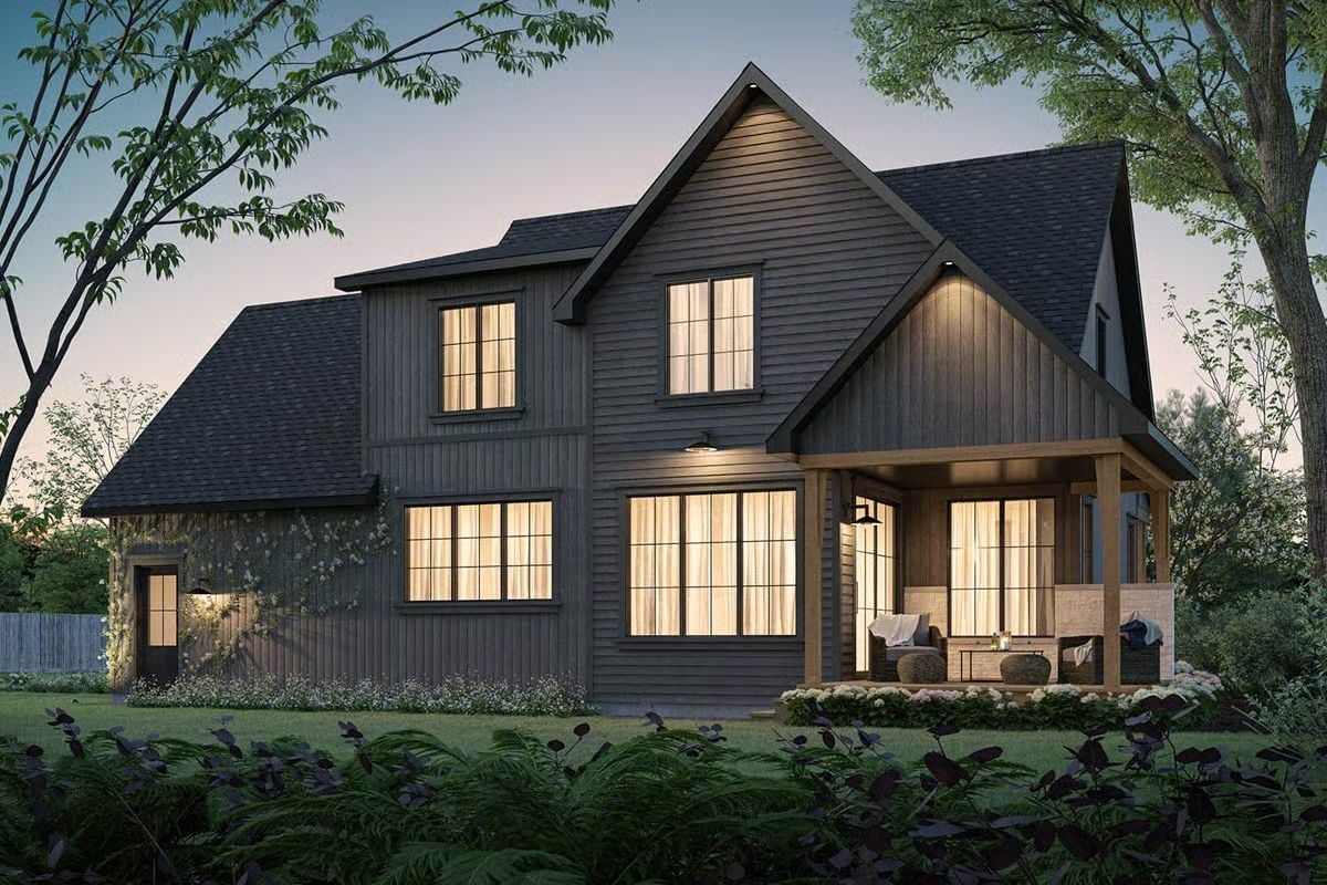 Dark Siding, Warm Light, and a Covered Terrace That Actually Gets Used