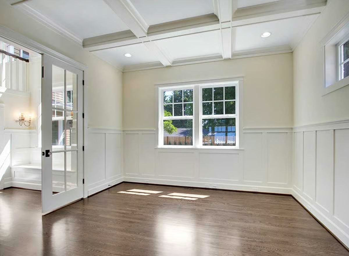 Coffered Ceiling and Board-and-Batten Walls Earn Every Inch of Empty Space