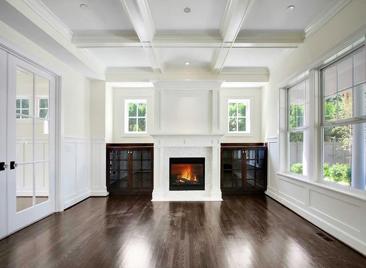 Coffered Ceilings and a Live-Fire Hearth Set a Serious Tone