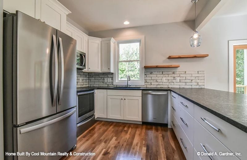 Painted Brick Backsplash and a Floating Shelf That Earn Their Keep