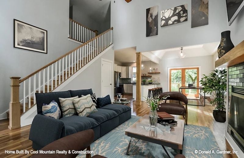 Soaring Ceilings and a Navy Sofa That Actually Anchors the Room