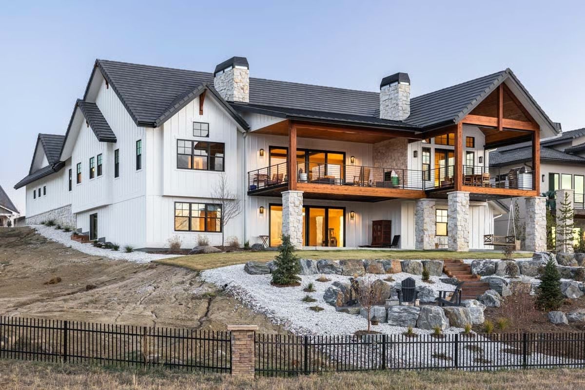 Stone Columns, Cedar Beams, and a Back Deck Built for Every Season