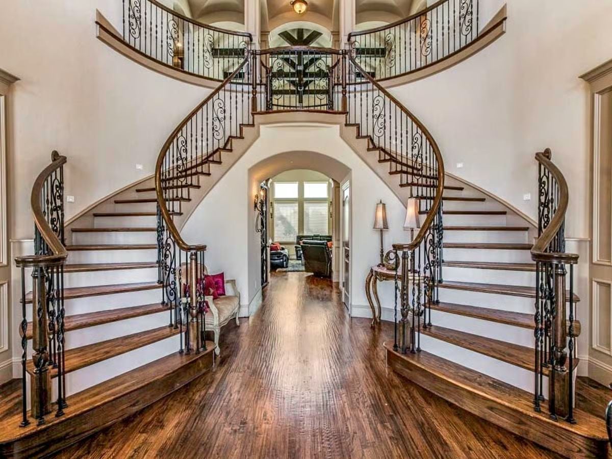 Dual Curved Staircases That Made the Whole House Worth Building