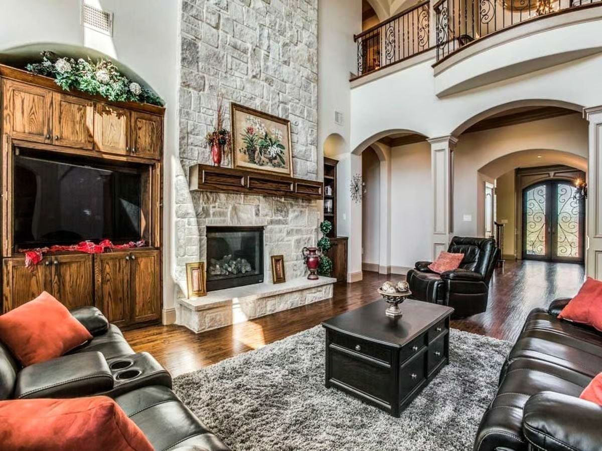 Floor-to-Ceiling Stone Fireplace That Earns Every Inch of Wall Space