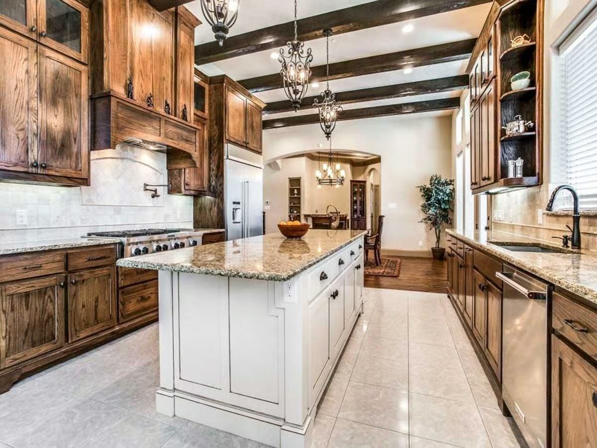 Painted Island, Raw Wood Cabinets, and Granite That Ties Them Together