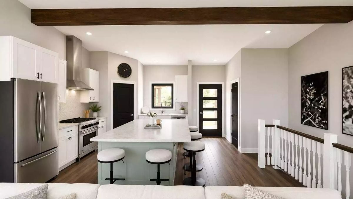 Sage Green Island Base Against White Shaker Cabinets Is a Combination That Holds Up