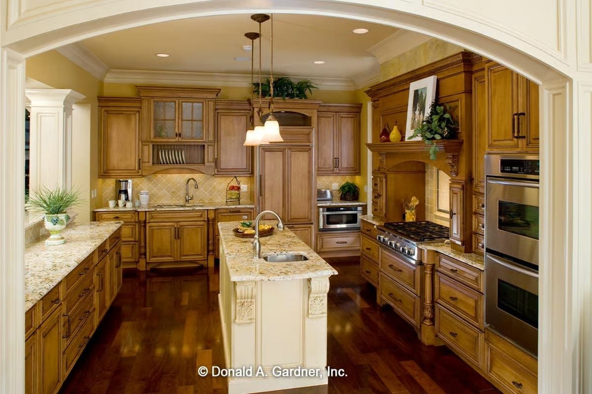 Carved Corbels and Granite Counters Make This Kitchen Worth Gathering In