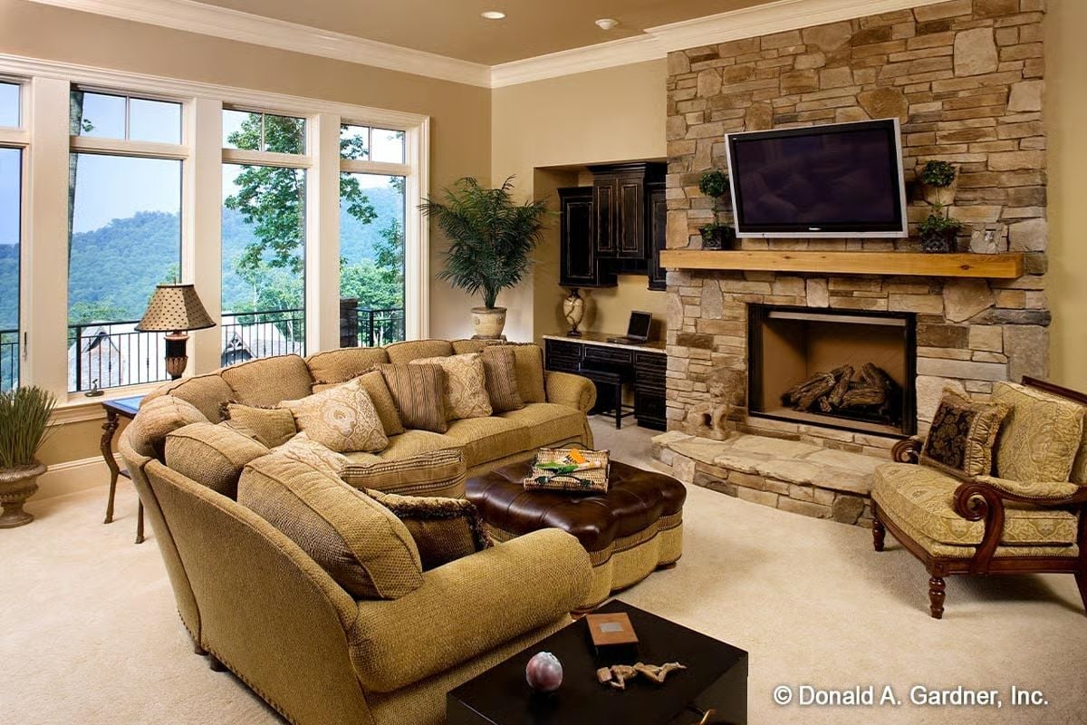 Stone Fireplace Wall and Mountain Views Compete for Attention in This Family Room