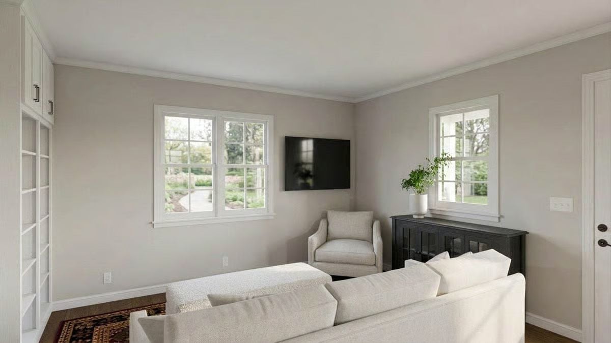 Warm Greige Walls and a Wall-Mounted TV That Doesn't Fight for Attention