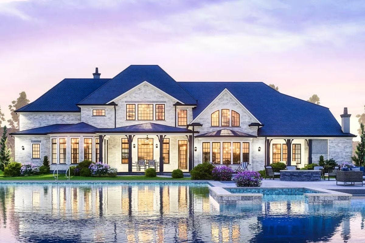 Blue Roof, Stone Walls, and a Pool That Reflects the Whole Thing Back at You