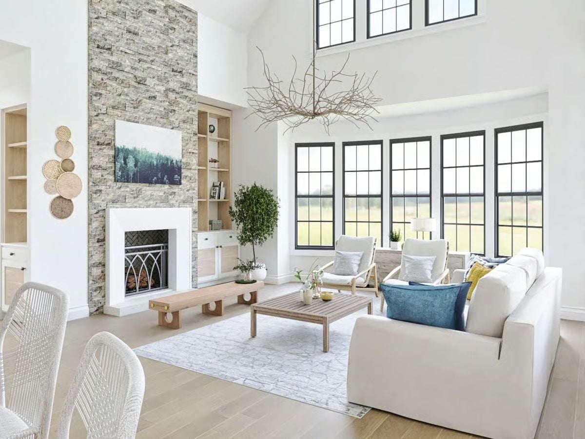 Floor-to-Ceiling Stone and Black Windows Built to Make an Impression