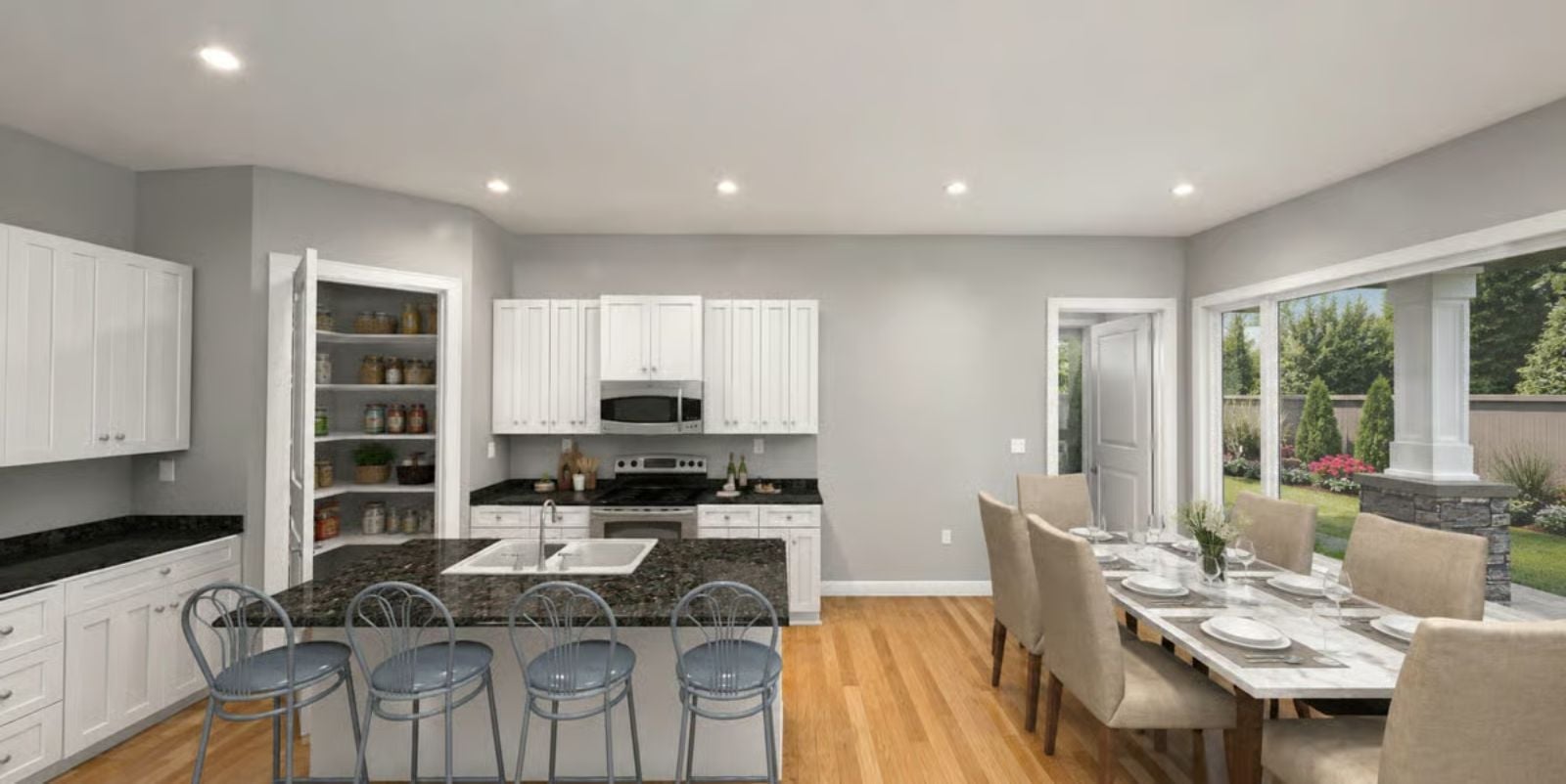 Dark Granite, White Cabinets, and a Pantry Worth Bragging About