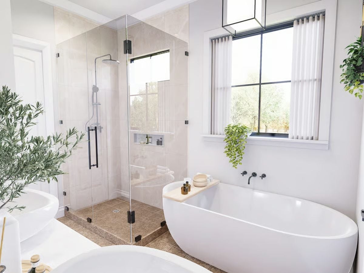 Frameless Glass, a Soaking Tub, and Enough Natural Light to Skip the Overhead Fixture