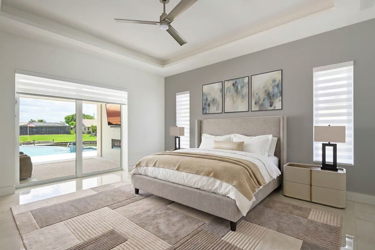 Sliding Glass Doors Blur the Line Between Master Suite and Pool Deck