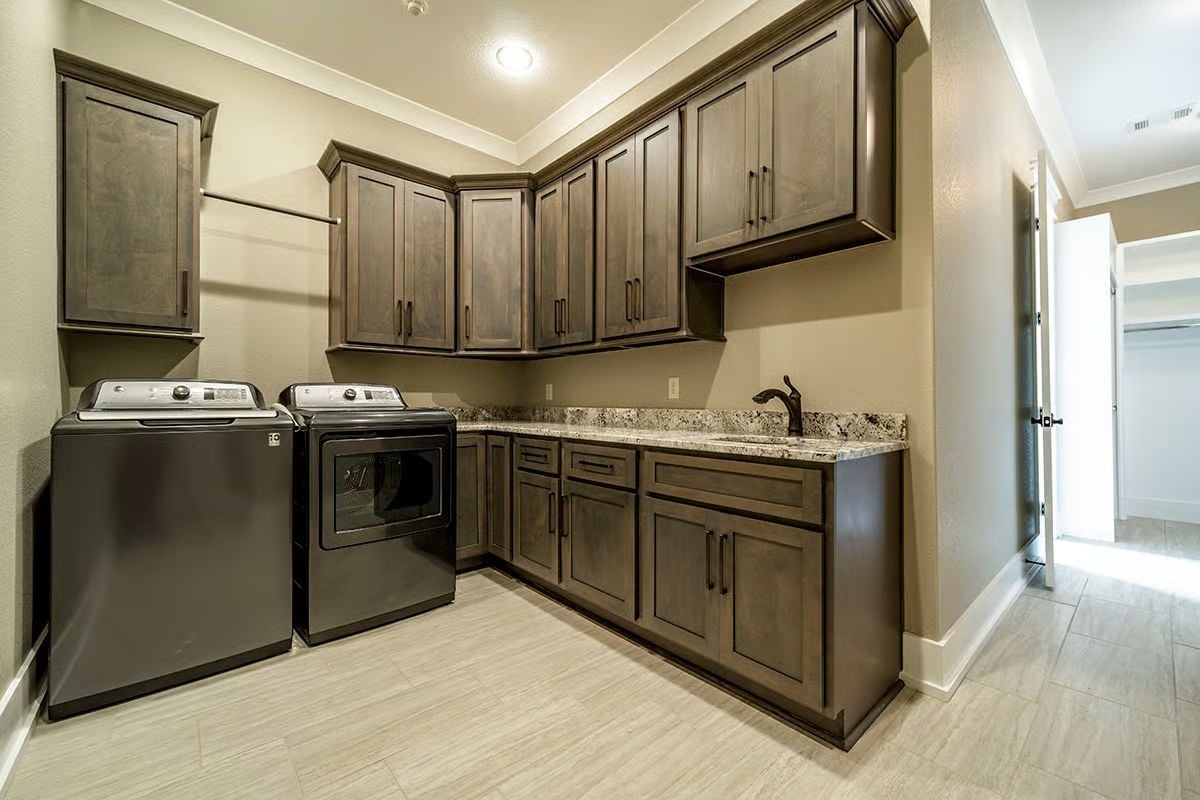 Dark Cabinets, Granite Counters, and a Laundry Room That Finally Has Its Act Together