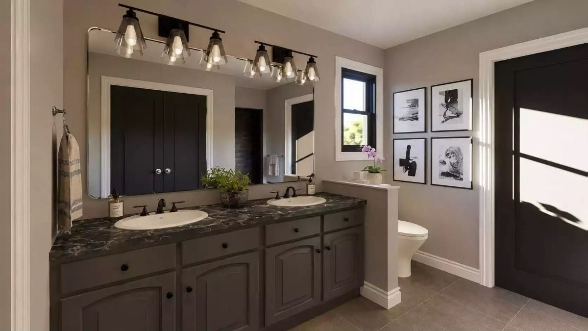 Dark Countertops, Double Sinks, and a Vanity Light Bar Worth the Splurge
