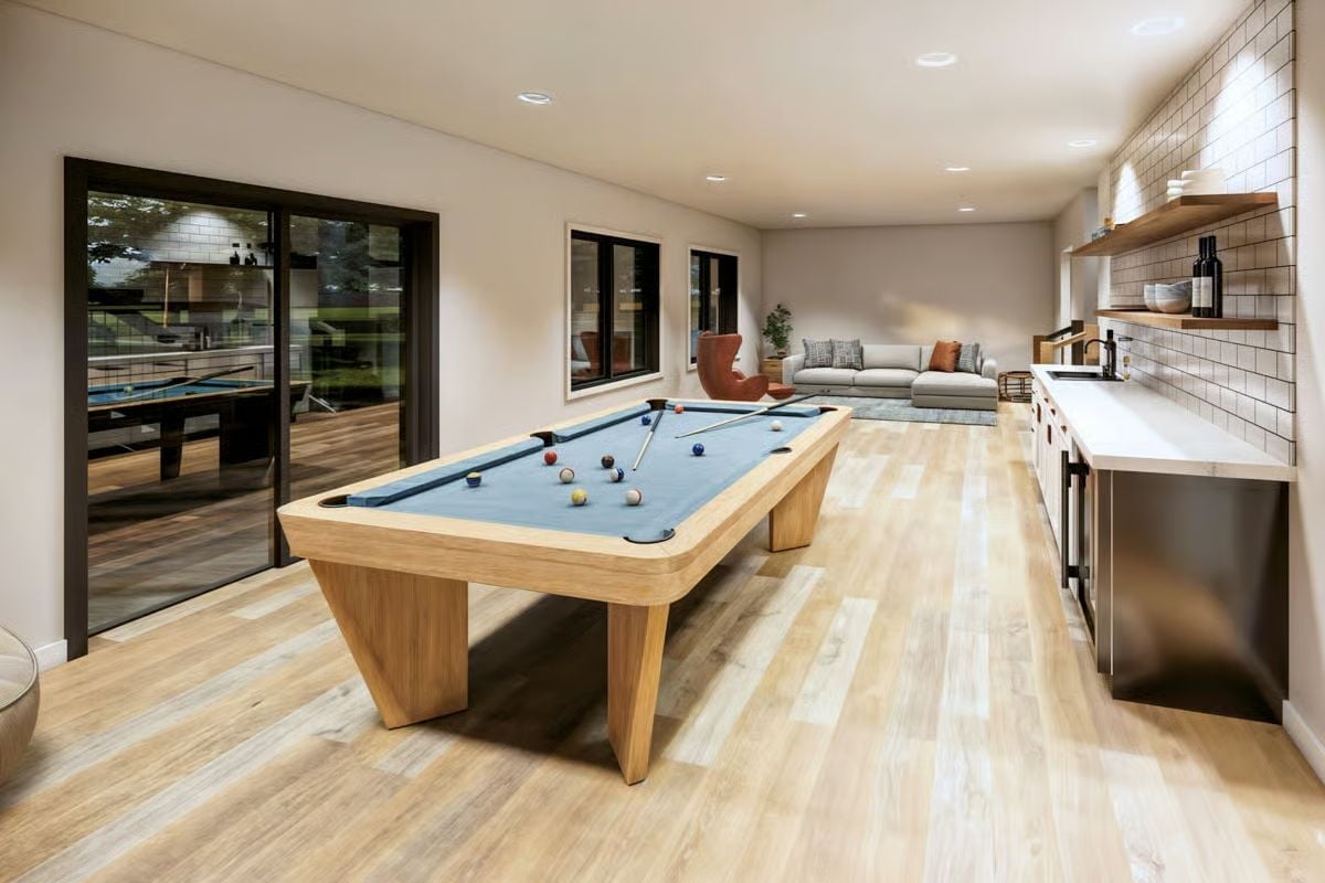 Billiard Room With a Wet Bar and Sliding Glass Doors That Pull the Space Wide Open