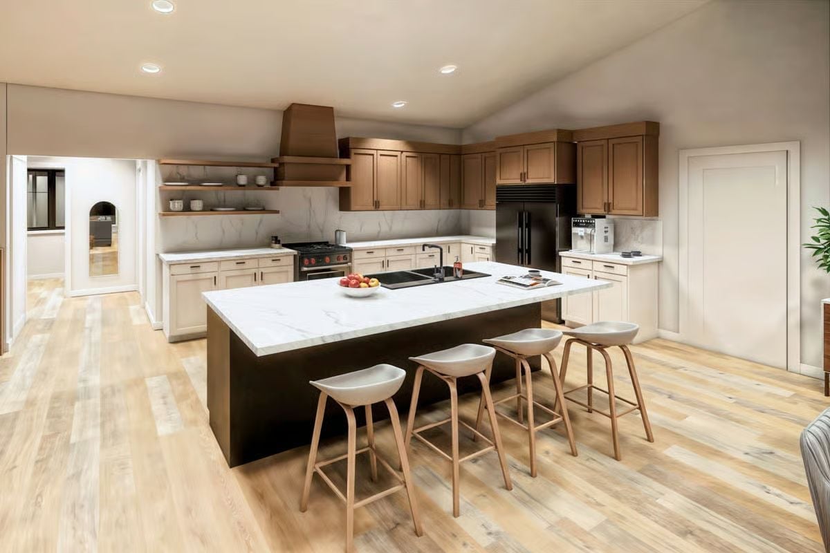 Marble Island, Dark Base, Wood Cabinets — Three Finishes That Somehow Agree